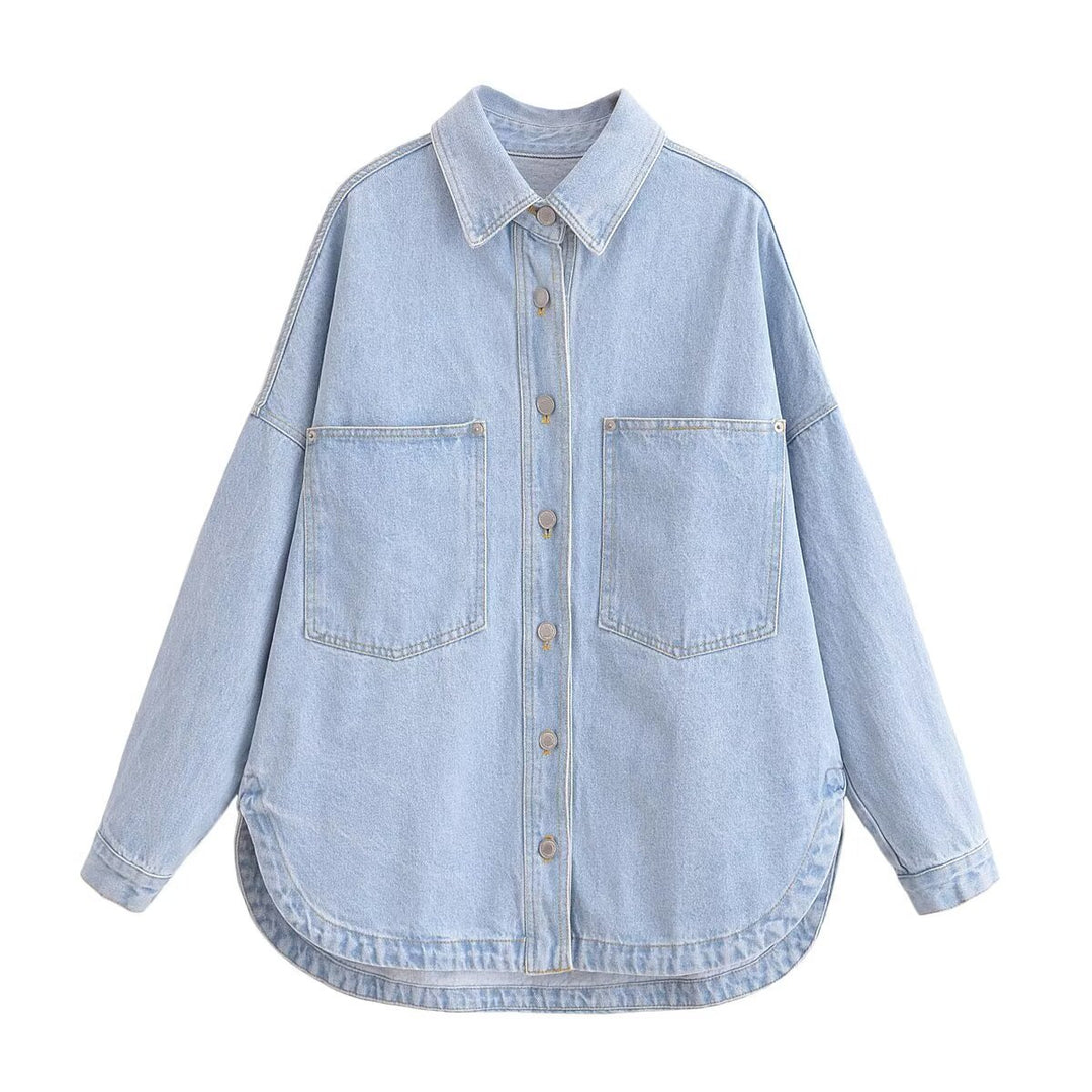 Women's oversized denim shirt with patch chest pockets, lightweight cotton denim, and rounded hem Mune Fashion