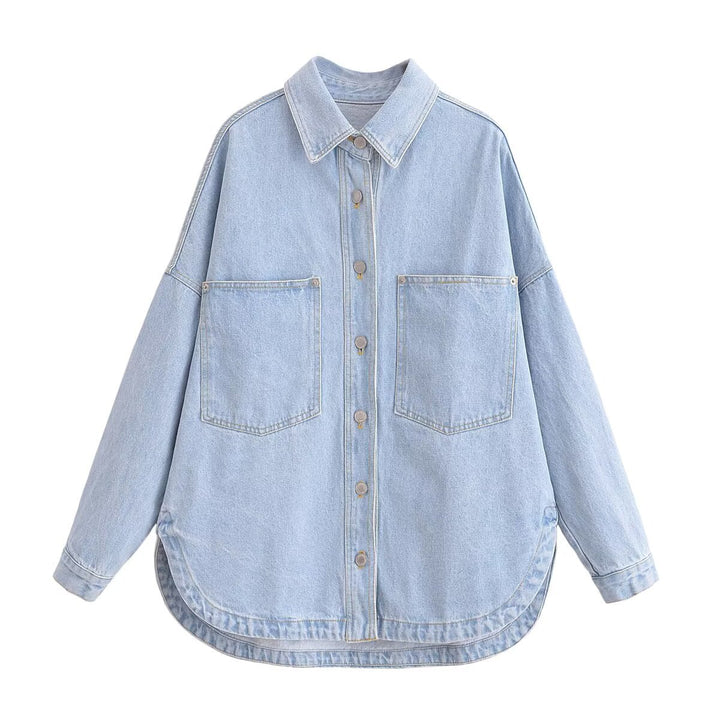 Women's oversized denim shirt with patch chest pockets, lightweight cotton denim, and rounded hem Mune Fashion