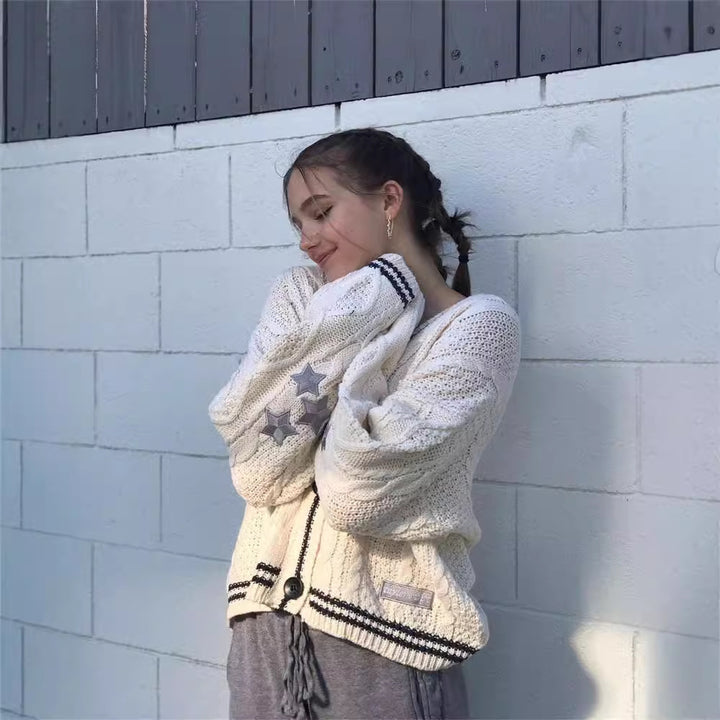 Women's oversized cable-knit cardigan with V-neck and contrasting knit edges Mune Fashion
