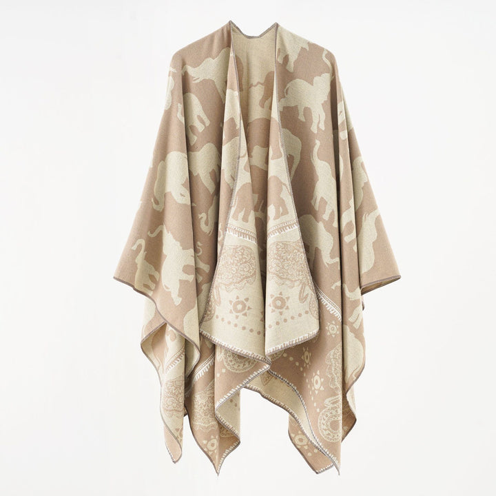 Ladies Jacquard Ruana with elephant motif and ornamental border Mune Fashion