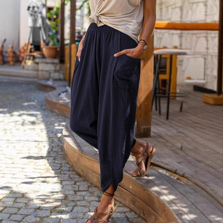 Women’s casual harem pants with elastic smock waistband, patch pockets, and gathered ankle cuffs Mune Fashion