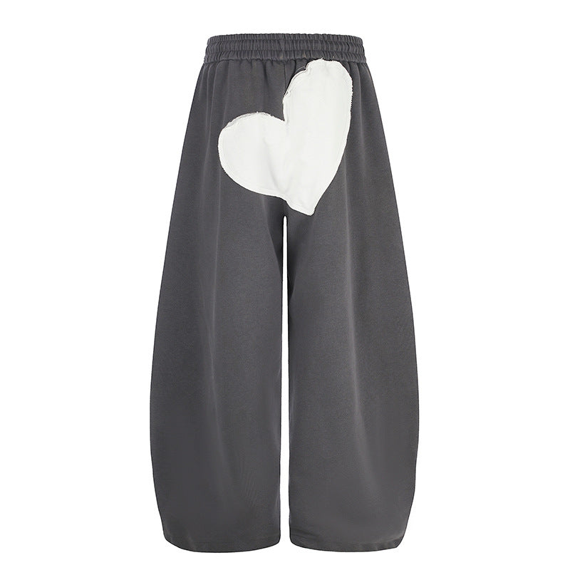 Women wide culotte sweatpants with elastic waistband and heart application Mune Fashion