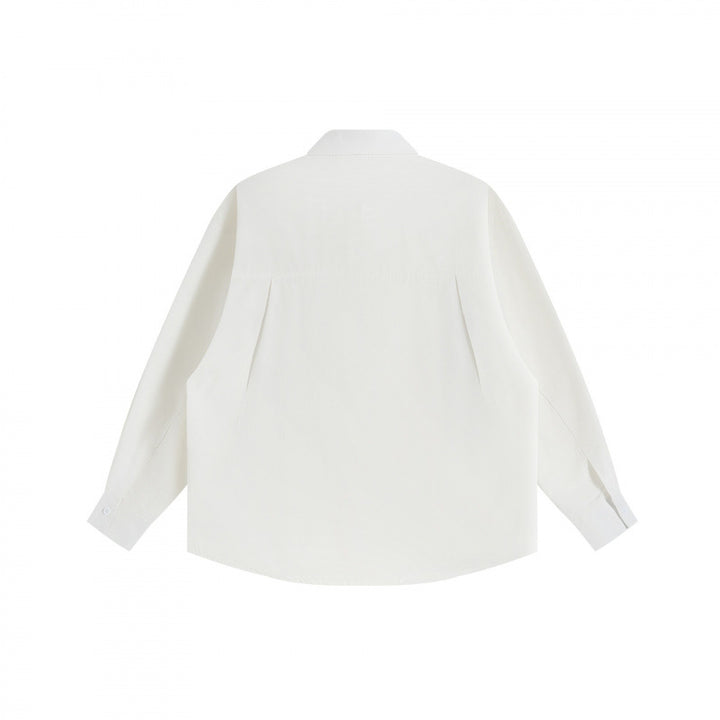 Unisex Oversize shirt with sewn-on retro patch applications and boxy silhouette Mune Fashion