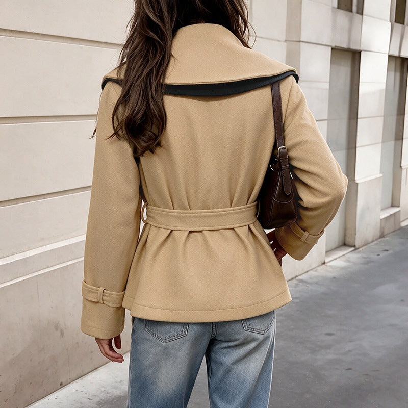 Women's short-cut wool blend coat with wide lapel collar, tie belt, and buckle cuffs Mune Fashion