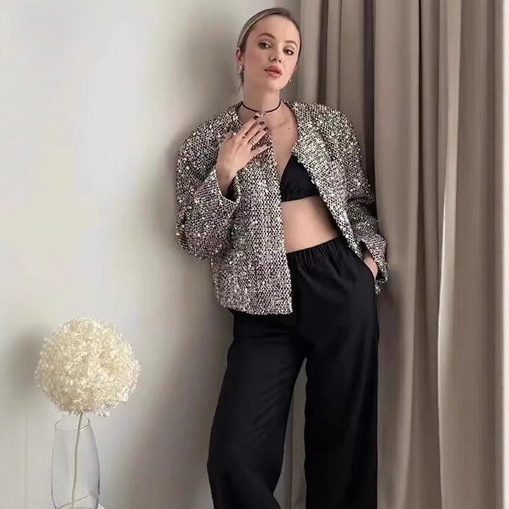 Women’s non-padded boucle short jacket with sequin embellishment, round neckline and open front Mune Fashion