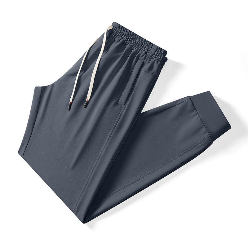 Men's Tech Jogging Pants with elastic drawstring waistband, concealed zipper pockets, and tailored ankle cuffs Mune Fashion