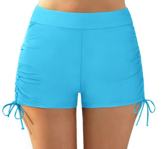 Women's figure-flattering swim shorts with gathering and side lacing Mune Fashion
