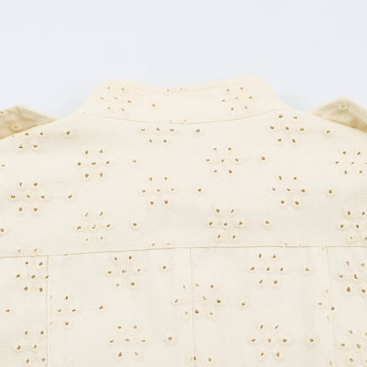 Ladies short jacket made of broderie anglaise with stand-up collar and patch pockets Mune Fashion