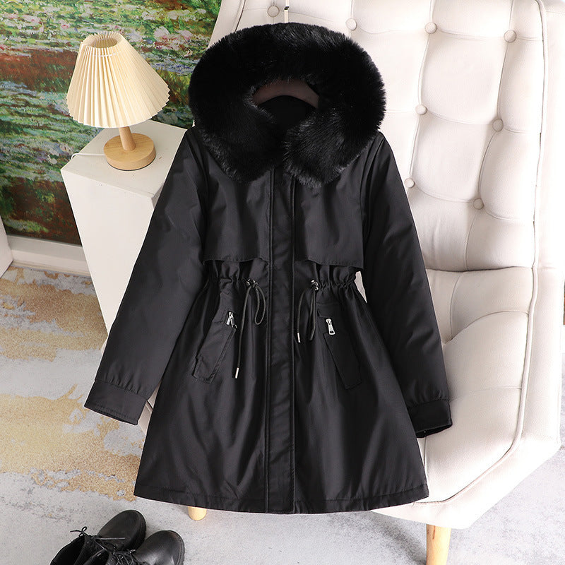Women's mid-length water-repellent parka with voluminous faux fur collar, waistband drawstring, and multifunctional flap pockets Mune Fashion