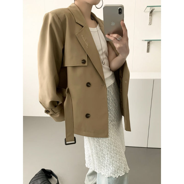 Women's short trench coat with figure-flattering tie belt and voluminous balloon sleeves Mune Fashion