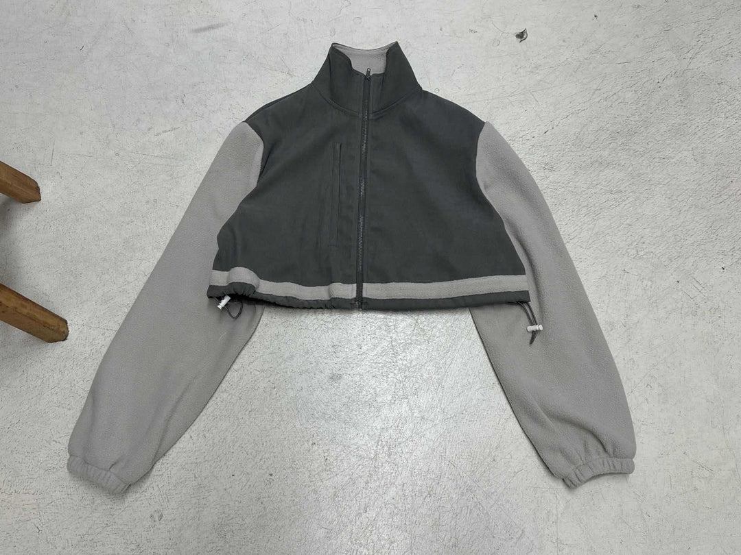 Women's short fleece zip jacket with stand-up collar, drawstring hem, and chest pocket Mune Fashion