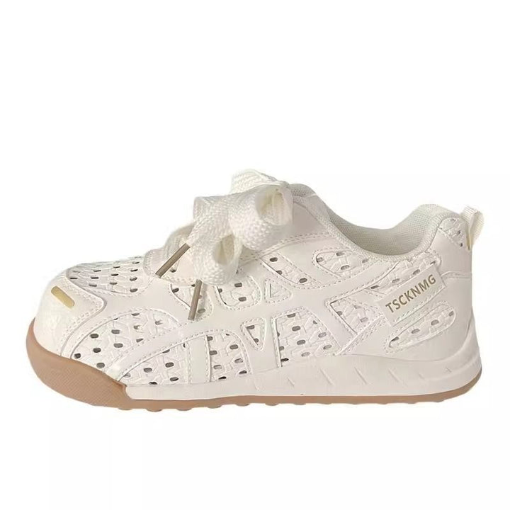 Ladies sporty platform sneakers with perforated upper material and decorative bows Mune Fashion