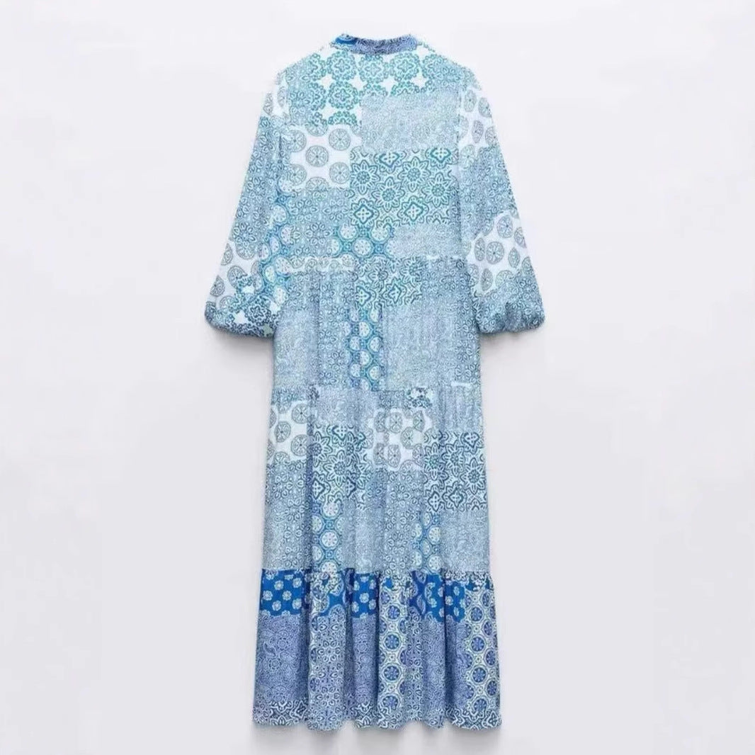 Women's maxi dress in patchwork print with V-neck, tiered skirt, and 3/4 sleeves Mune Fashion