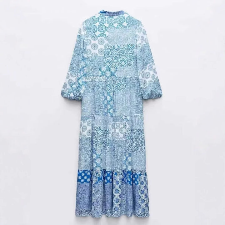 Women's maxi dress in patchwork print with V-neck, tiered skirt, and 3/4 sleeves Mune Fashion