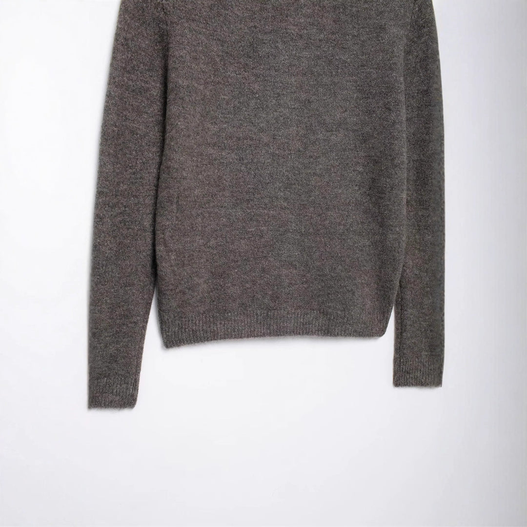 Women's fine knit cardigan with round neckline, continuous button placket, and slim silhouette Mune Fashion