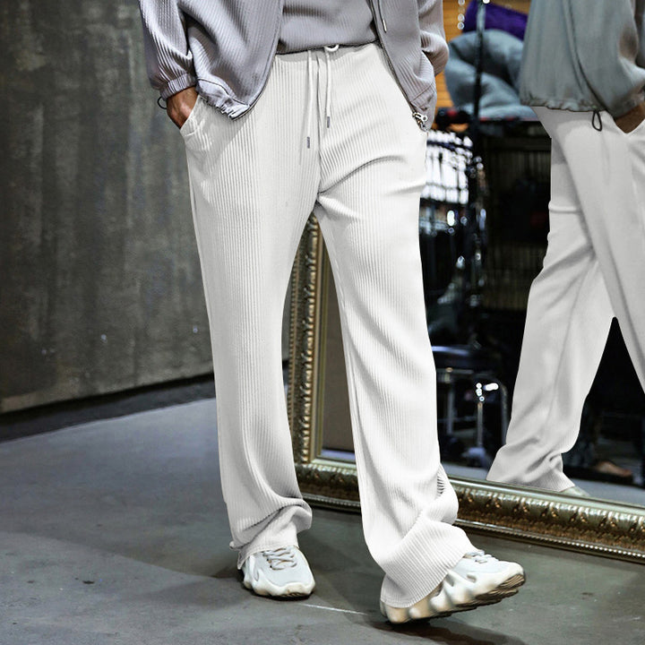 Men's loosely cut pleated trousers with drawstring and wide leg Mune Fashion