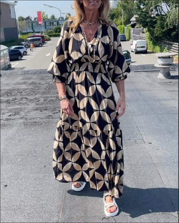 Women's maxi dress with geometric all-over print, smocked waist and ruffled tiers Mune Fashion