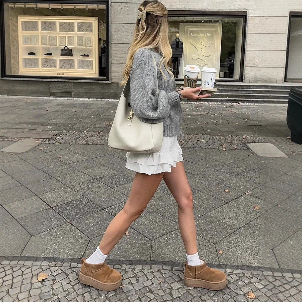 Women's cropped chunky knit cardigan with oversized balloon sleeves and visible button placket Mune Fashion