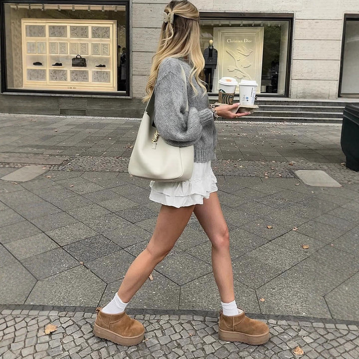 Women's cropped chunky knit cardigan with oversized balloon sleeves and visible button placket Mune Fashion