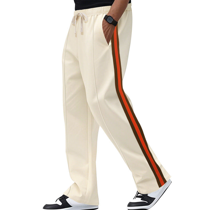 Men's wide lounge track pants with dual side stripe, elastic drawstring waistband and deep side pockets Mune Fashion