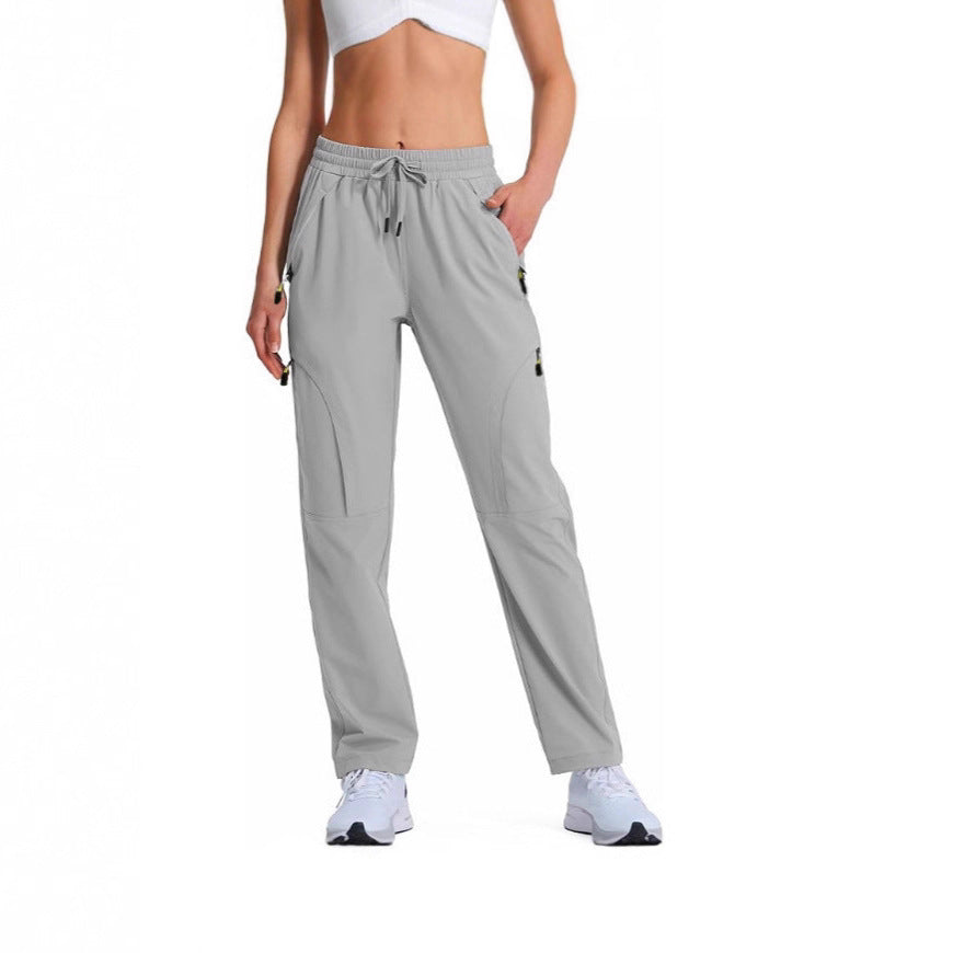 Women casual cargo pants with elastic waistband, drawstring, and zip pockets Mune Fashion