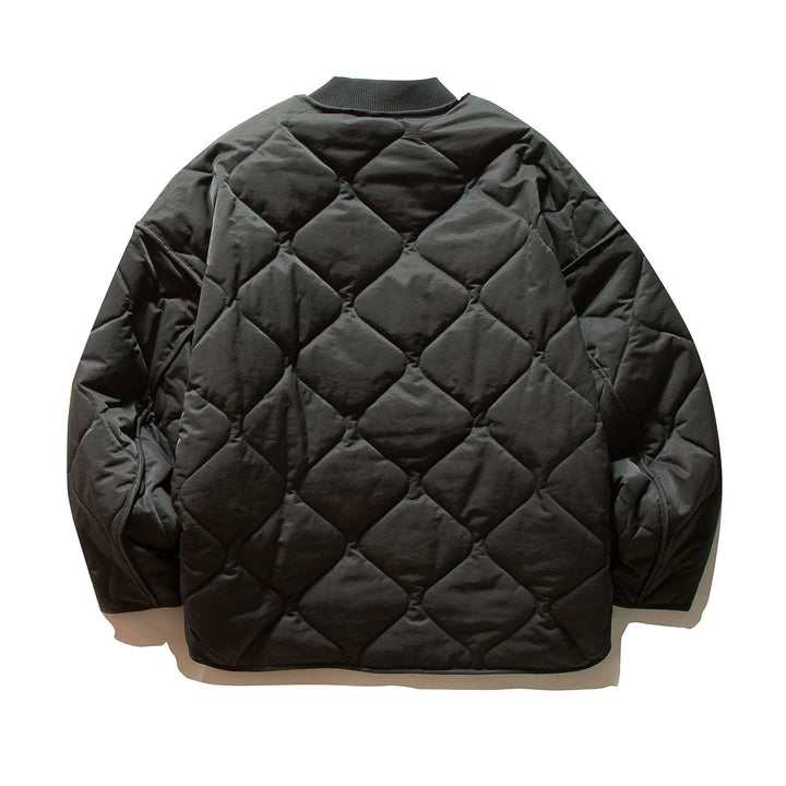 Unisex Short quilted bomber in boxy cut with ribbed collar and extra large flap pockets Mune Fashion