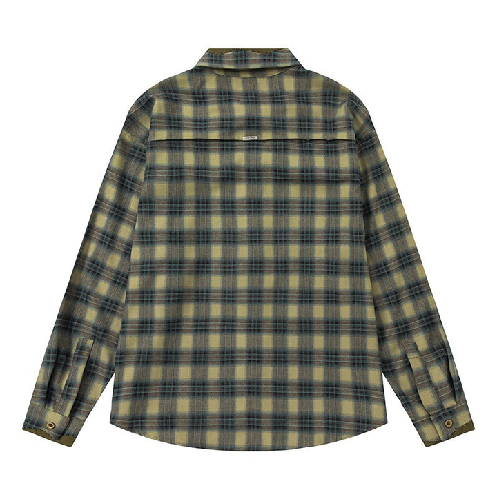Men's boxy flannel shirt with rounded hem, patch chest pockets, and soft texture Mune Fashion
