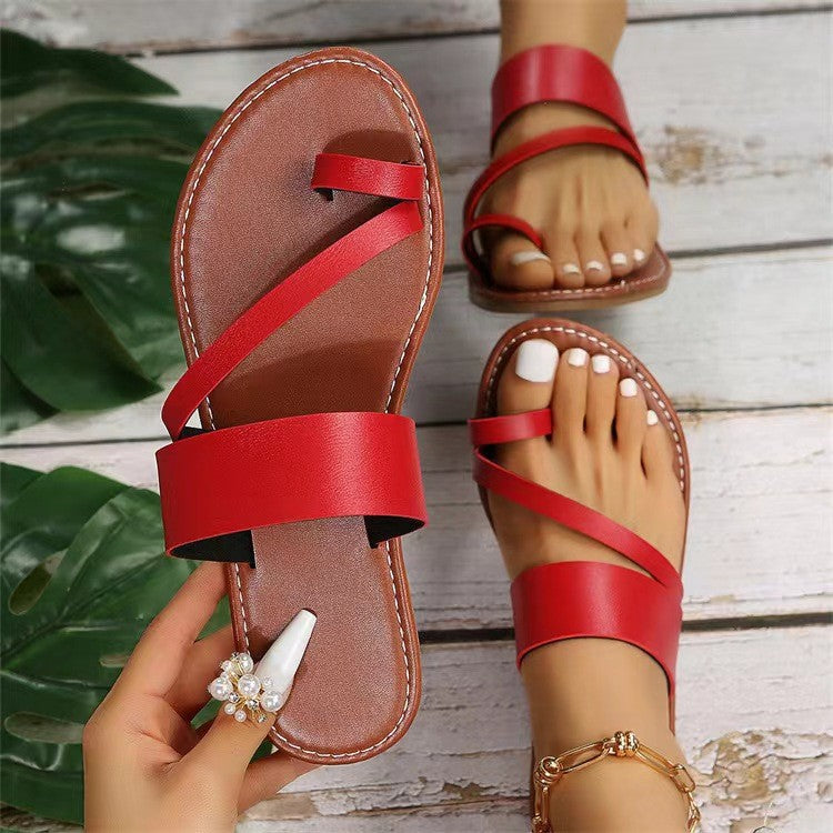 Women's flat faux leather thong sandal with crisscross straps and padded comfort footbed Mune Fashion