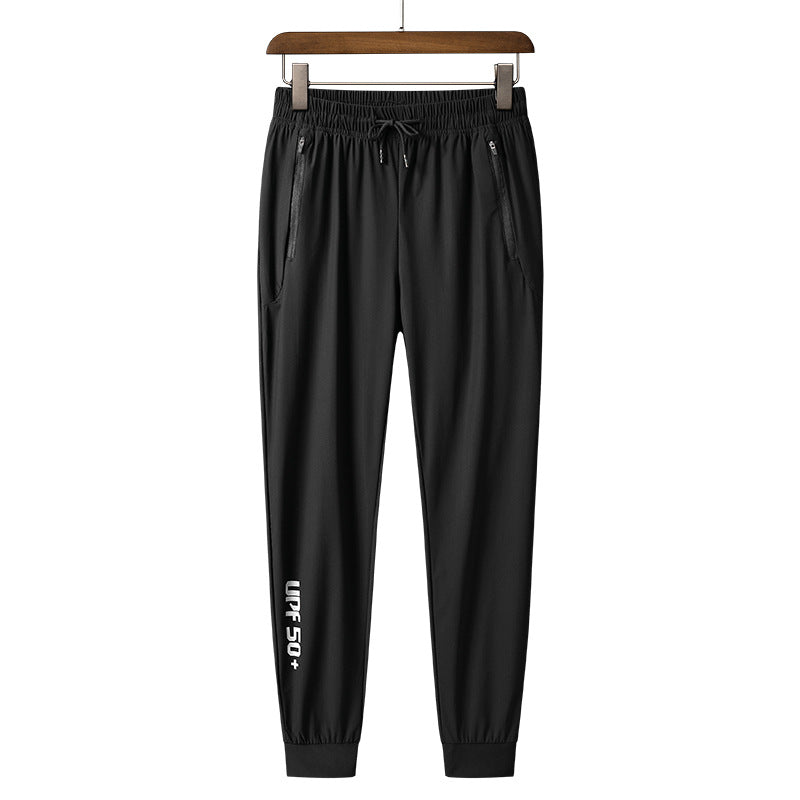 Men's sporty training pants with practical zip pockets Mune Fashion