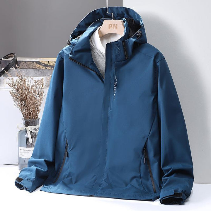 Women's Lightweight Softshell Hooded Jacket with Windproof Storm Flap and Concealed Zipper Pockets Mune Fashion