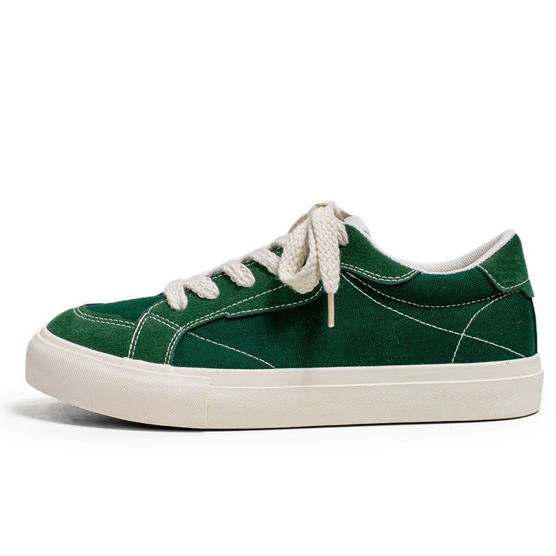 Unisex casual canvas low-top sneaker with contrasting decorative stitching and padded platform sole Mune Fashion