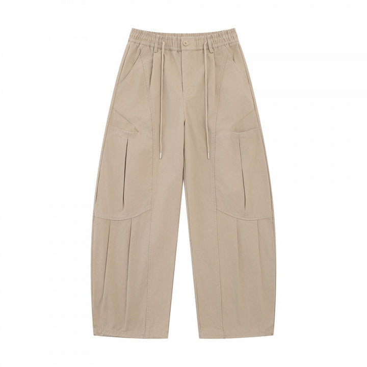 Unisex Wide Utility Cargo Pants made of cotton blend with drawstring waistband, large patch pockets, and balloon-shaped silhouette Mune Fashion