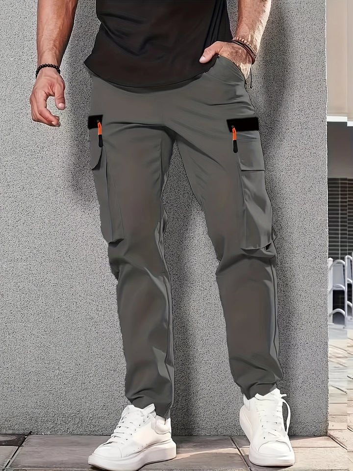 Men's cargo pants in jogger style with elastic waistband, drawstring & multiple pockets Mune Fashion