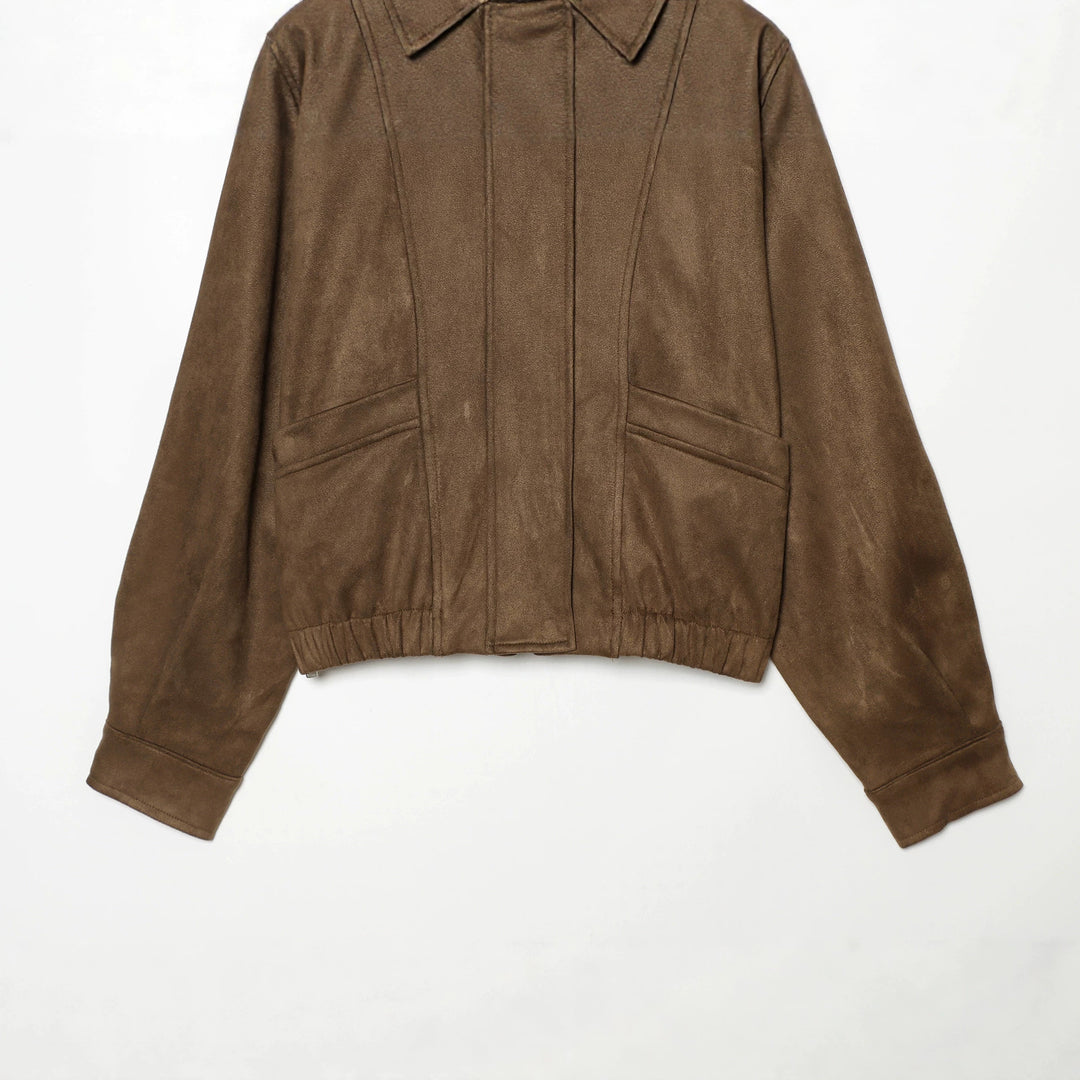 Women's cropped blouson jacket in suede look with shirt collar, epaulettes, and elastic waistband.