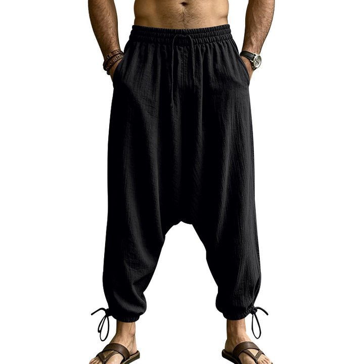 Men's harem pants with a low crotch, elastic waistband, and adjustable ankle cuffs Mune Fashion
