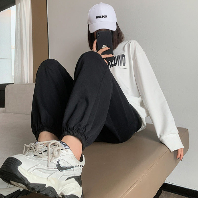 Women's relaxed-fit sweatpants with elastic drawstring waistband, side pockets, and stitched hem seams Mune Fashion