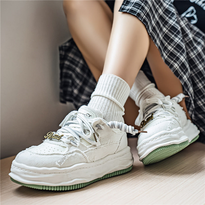 Women's denim platform sneaker with contrast stitching, padded wave sole and embellished lacing details Mune Fashion