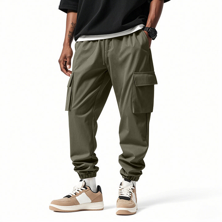 Men's Cargo Jogger Pants with elastic drawstring waistband, patch flap pockets and ribbed leg cuffs Mune Fashion