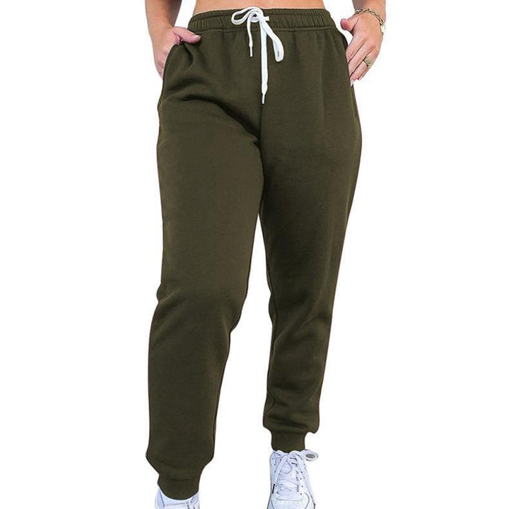 Women's tapered jogging pants at ankle height with elastic comfort waistband, adjustable drawstring, and deep side pockets Mune Fashion