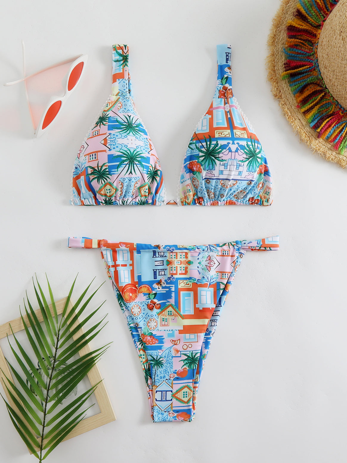 Women's bikini set with cheerful city motif and high-cut briefs Mune Fashion