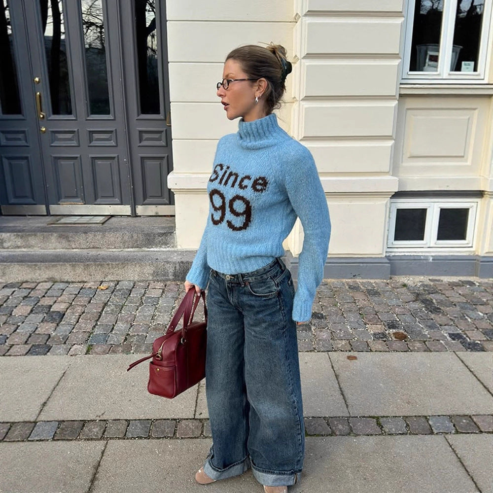Women's cozy oversized mohair sweater with high roll neck and statement logo Mune Fashion