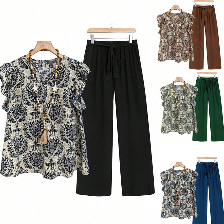 Women's two-piece ensemble with ruffled print blouse and wide waist trousers model Mune Fashion