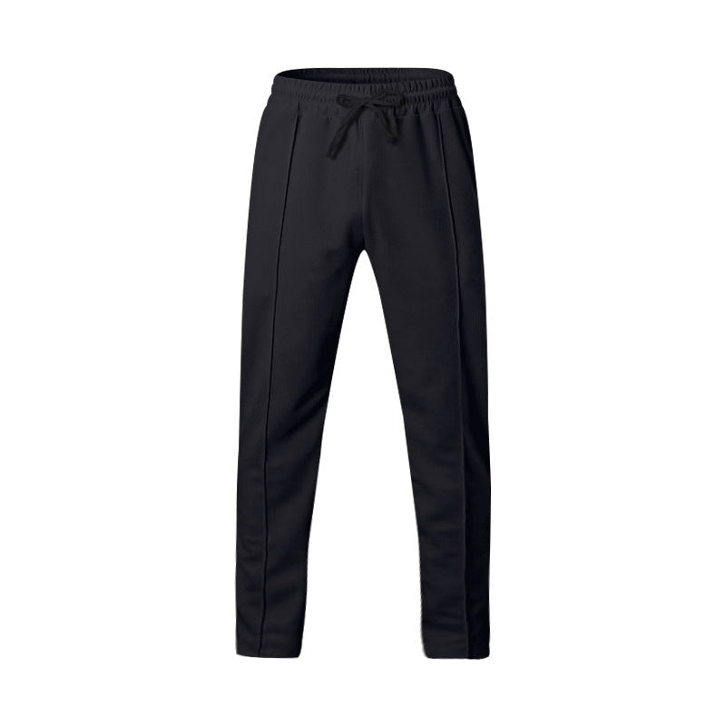 Men's sporty joggers with elastic waistband and front center seam Mune Fashion