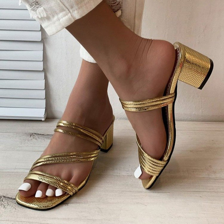Ladies an elegant multi-strap mule with mid-high block heel and snake print Mune Fashion