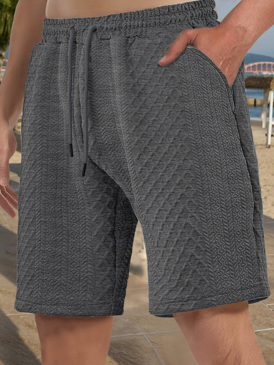 Men's textured beach bermuda shorts made of waffle jersey with elastic drawstring waistband and slanted pockets Mune Fashion