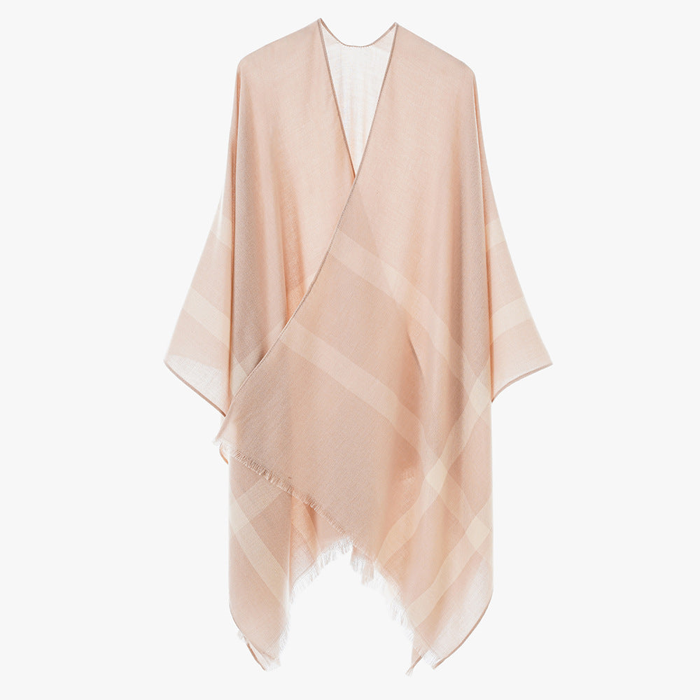 Women’s lightweight fine knit cape with diagonal contrasting stripes and fringes Mune Fashion