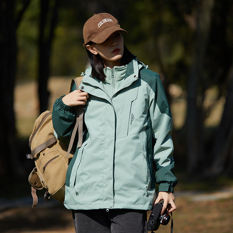 Women two-layer water-repellent outdoor jacket with hood, waist adjustment and contrast piping Mune Fashion