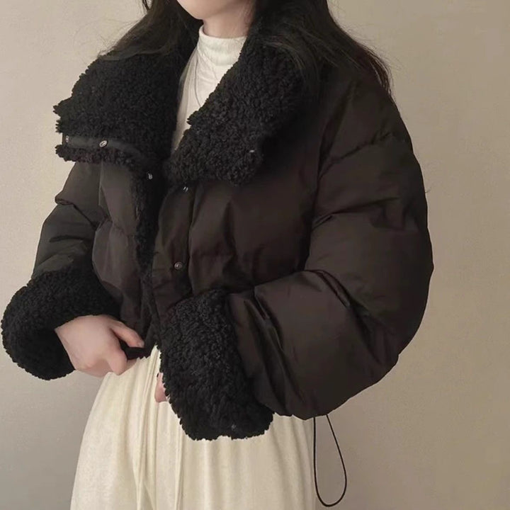 Women's short quilted puffer jacket with teddy collar, roll-up sleeves, and drawstring hem Mune Fashion