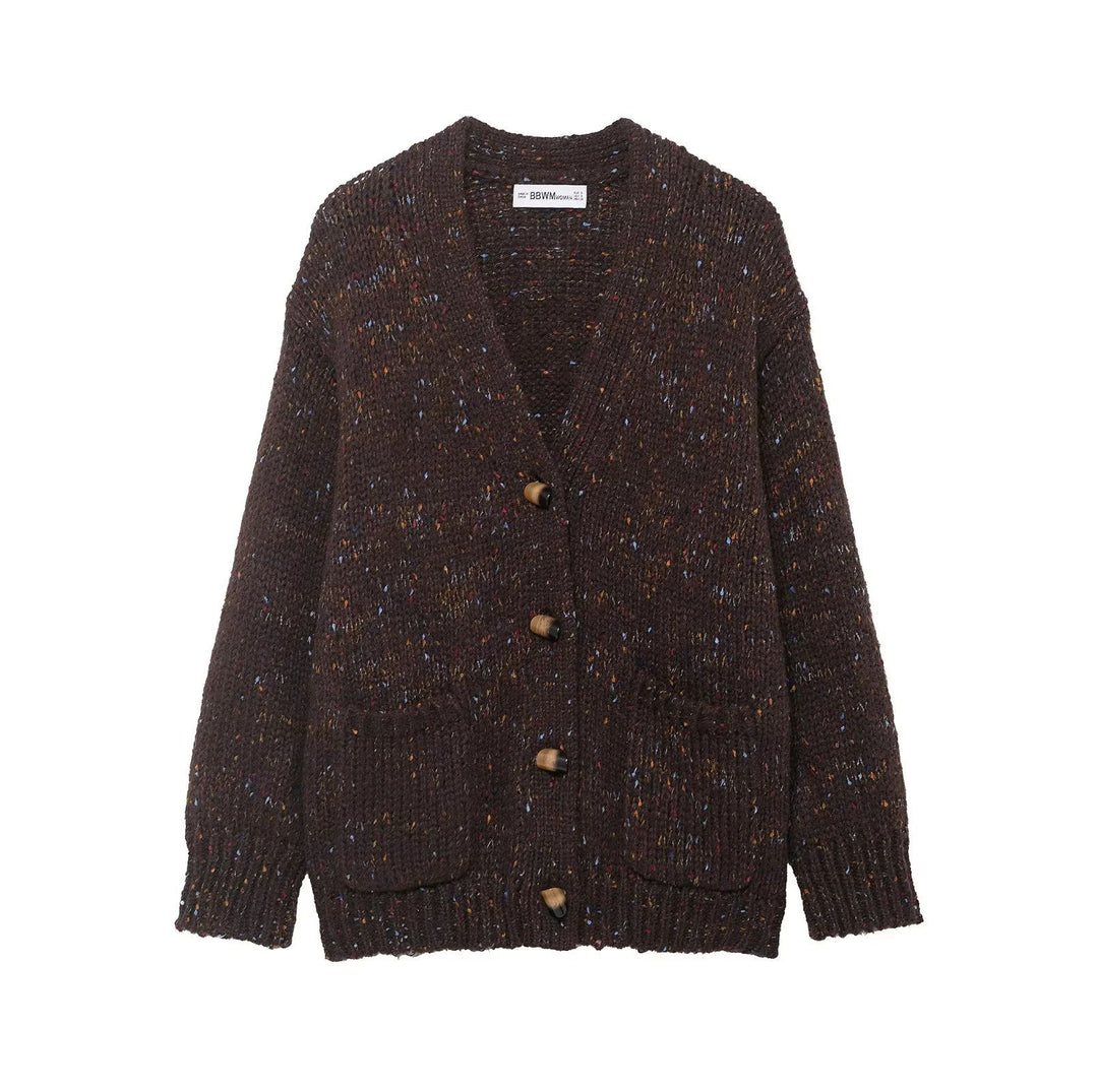 Women’s chunky knit cardigan with horn button front and patch pockets Mune Fashion
