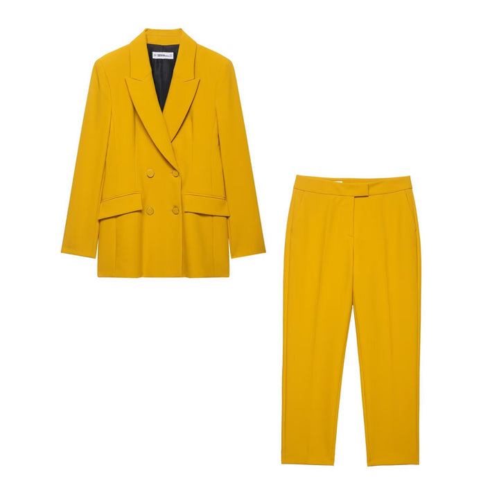 Women's double-breasted long blazer with striking lapels and decorative eyelet buttons Drune